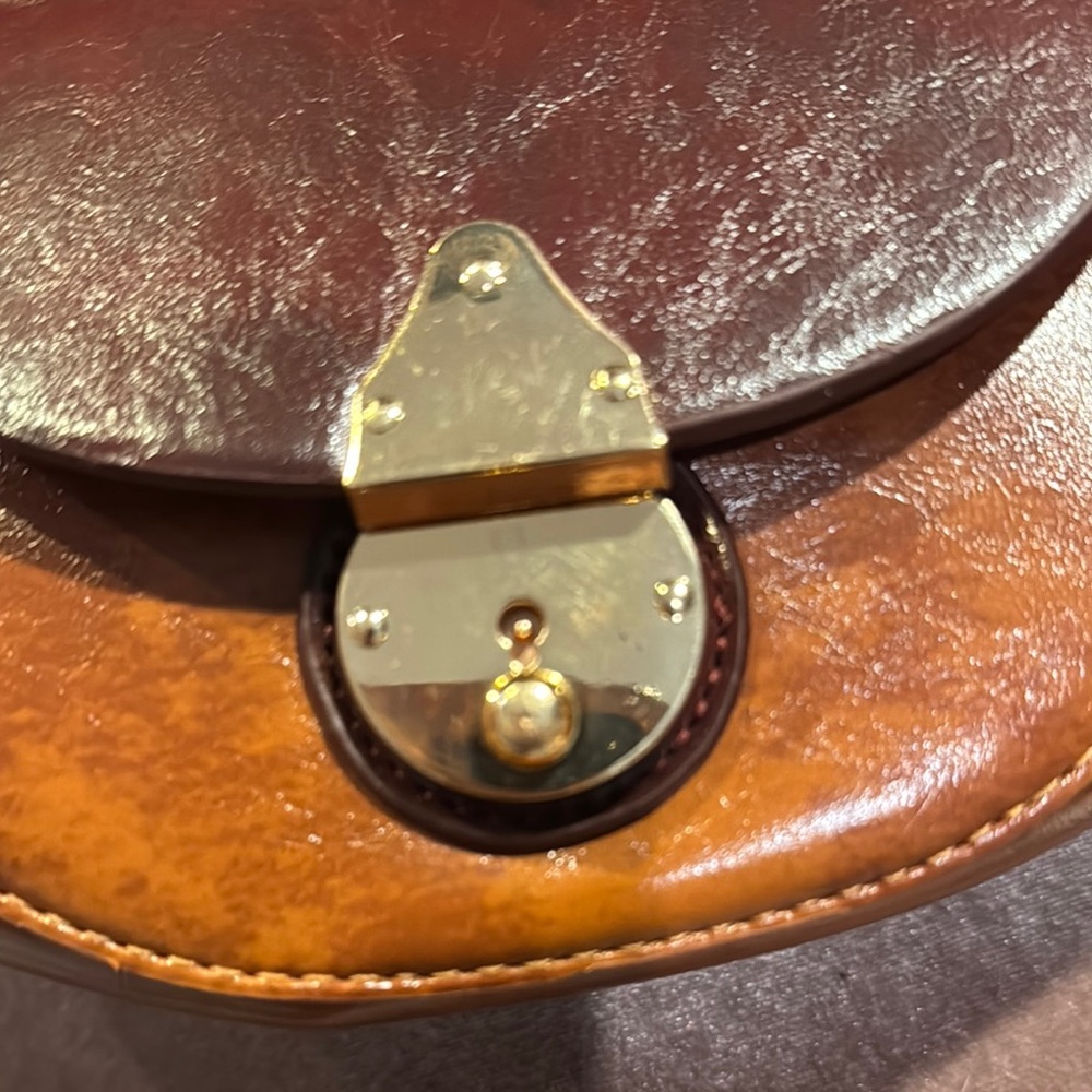Brown Vegan Leather Clutch with Decorative Clasp and Structured Design - Picture 3 of 9